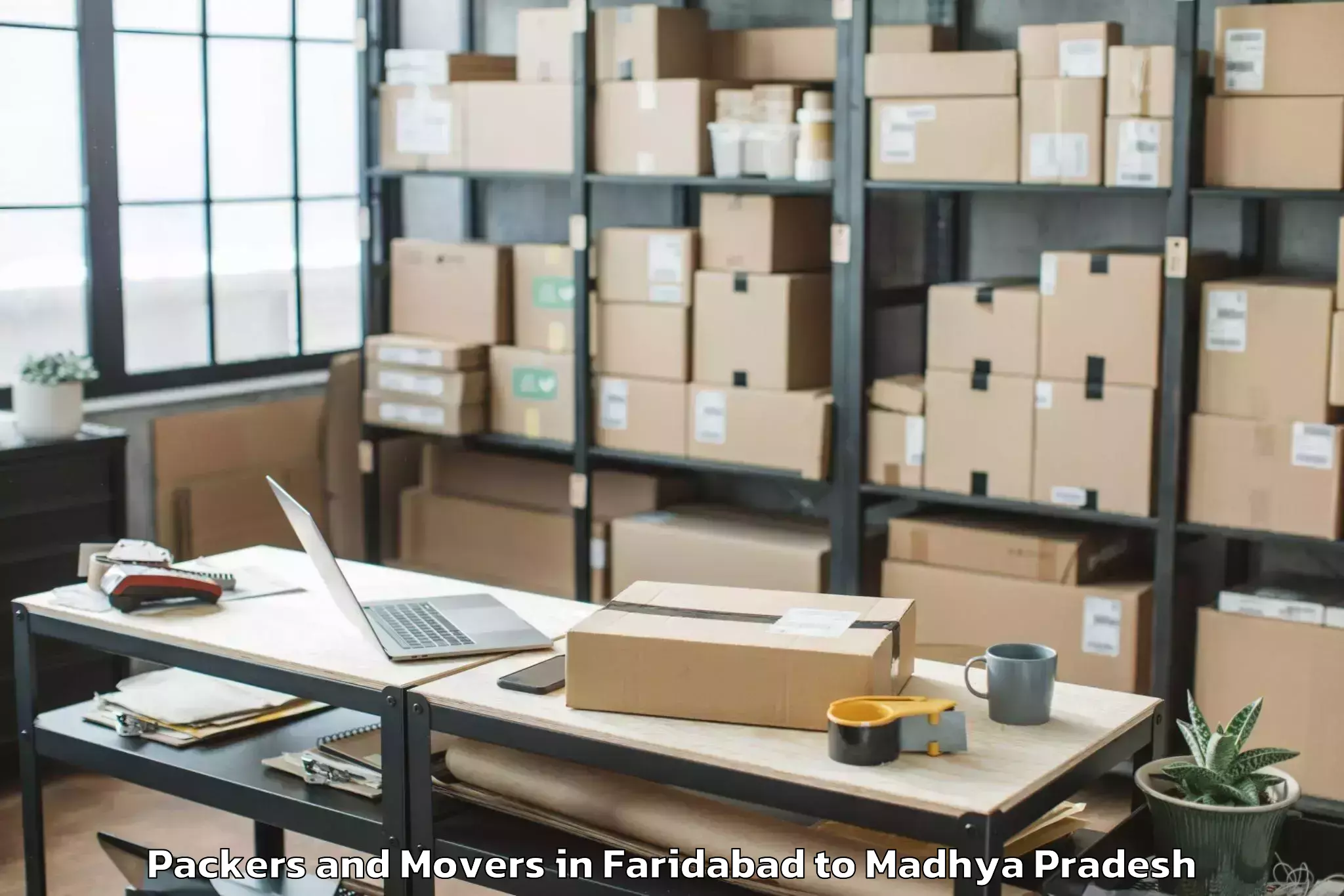 Book Faridabad to Sanwer Packers And Movers